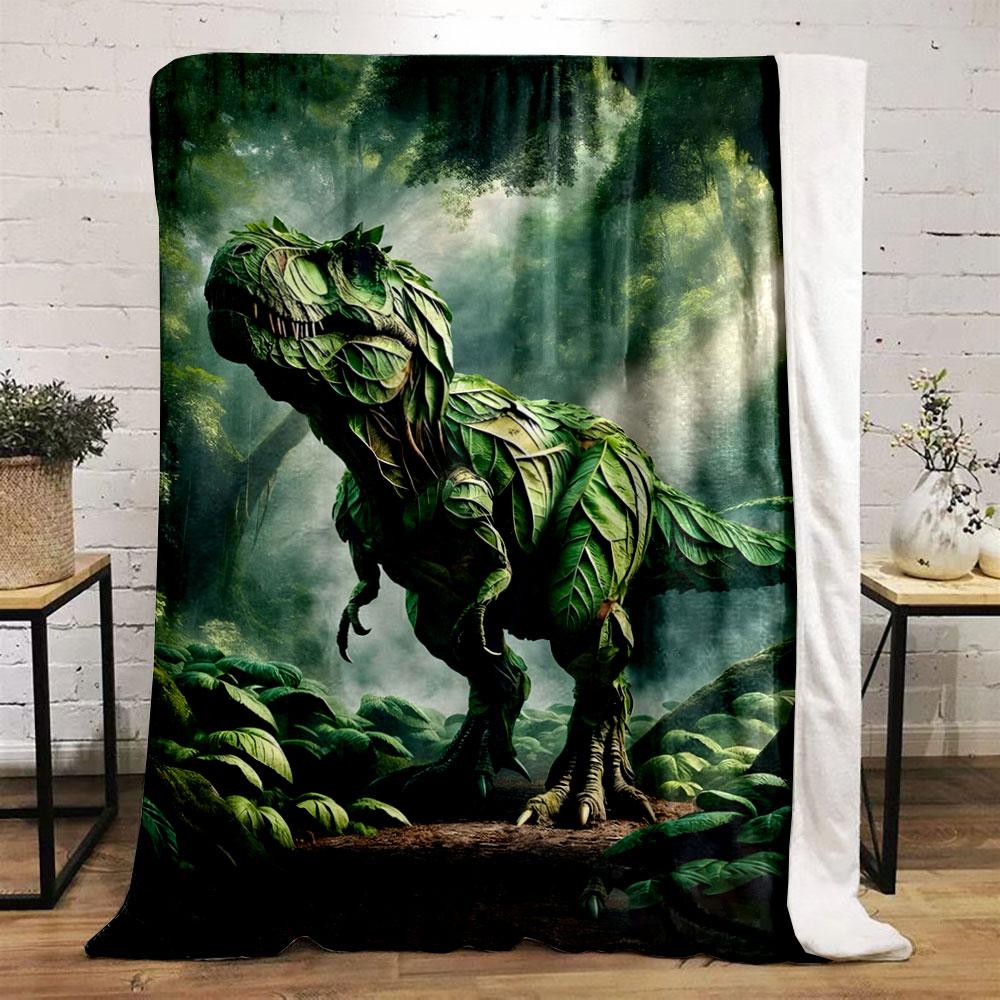 A dinosaur-shaped figure created entirely from overlapping green leaves. for all seasons blanket lunch break throw gift