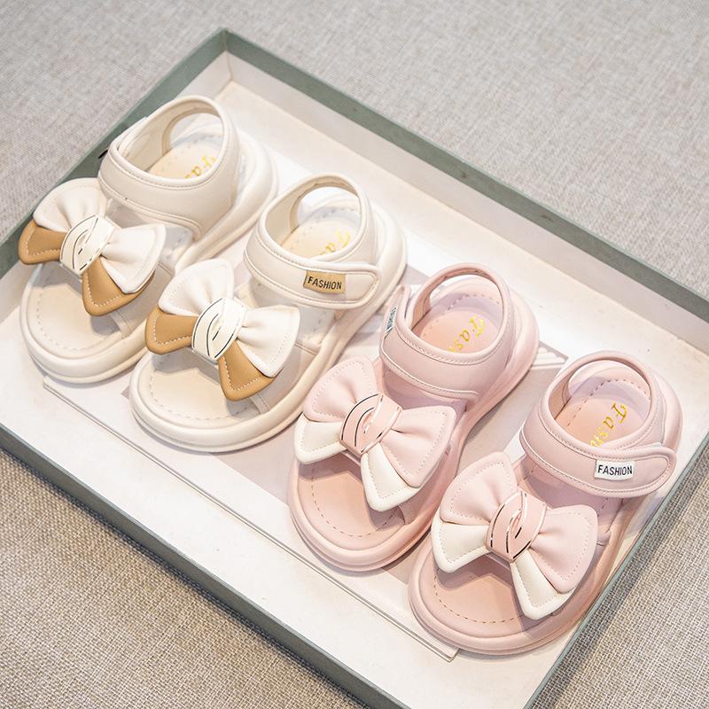 

2025 лето новая мода девочка удобная принцесса писать девочка повседневные банты сандалии письмо пляжная обувь 26-30 yards FCL mixed batch shot 50 pairs