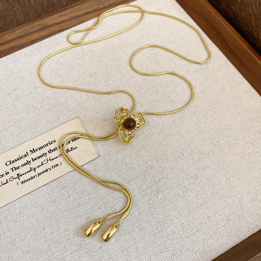 Подвеска-ожерелье Maillard Тигровый глаз Фейерверк: Осенне-зимнее ретро длинное ожерелье-свитер для женщин.