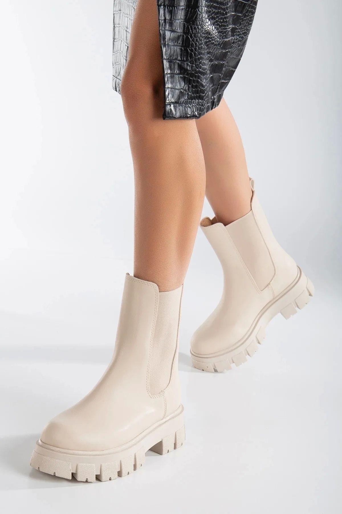 

Женские современные стильные модные женские сапоги на эластичной подошве цвета кожи с подошвой Aris сбоку и на коротком каблуке 39