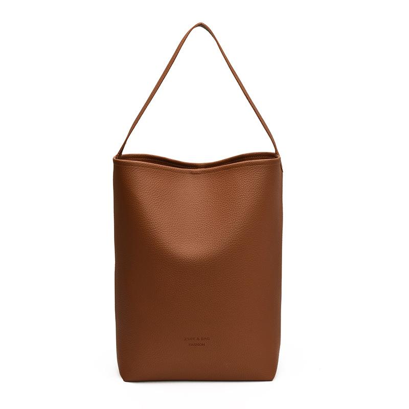 Retro casual bucket bag women's simple fashion shoulder bag large capacity sense high sense commuter messenger bag