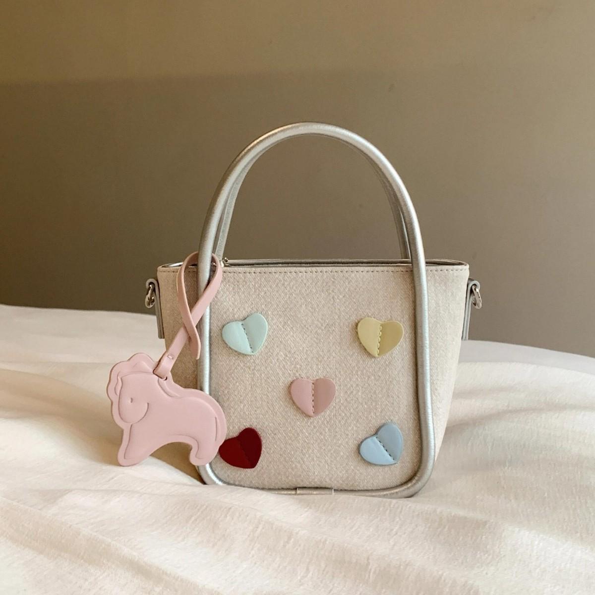 

Trendy versatile portable bucket bag women s summer new simple shoulder bag commuter messenger bag