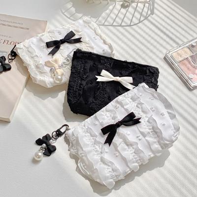 Sac de rangement mignon à nœud pour filles Porte-monnaie doux de couleur unie Sac pour tête de rouge à lèvres Casque Grande capacité Pochette en dentelle