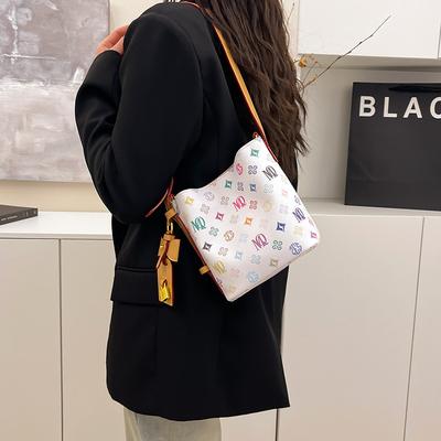 Årets populära tryckta bucket bag 2025 vår och sommar ny mode axelväska high-end messenger bag