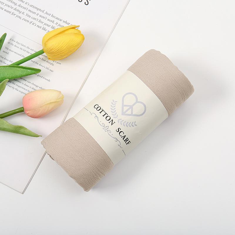 Autumn and winter new micro-elastic crumpled cotton blended long towel right angle lock edge polyester headscarf hot-selling solid color scarf