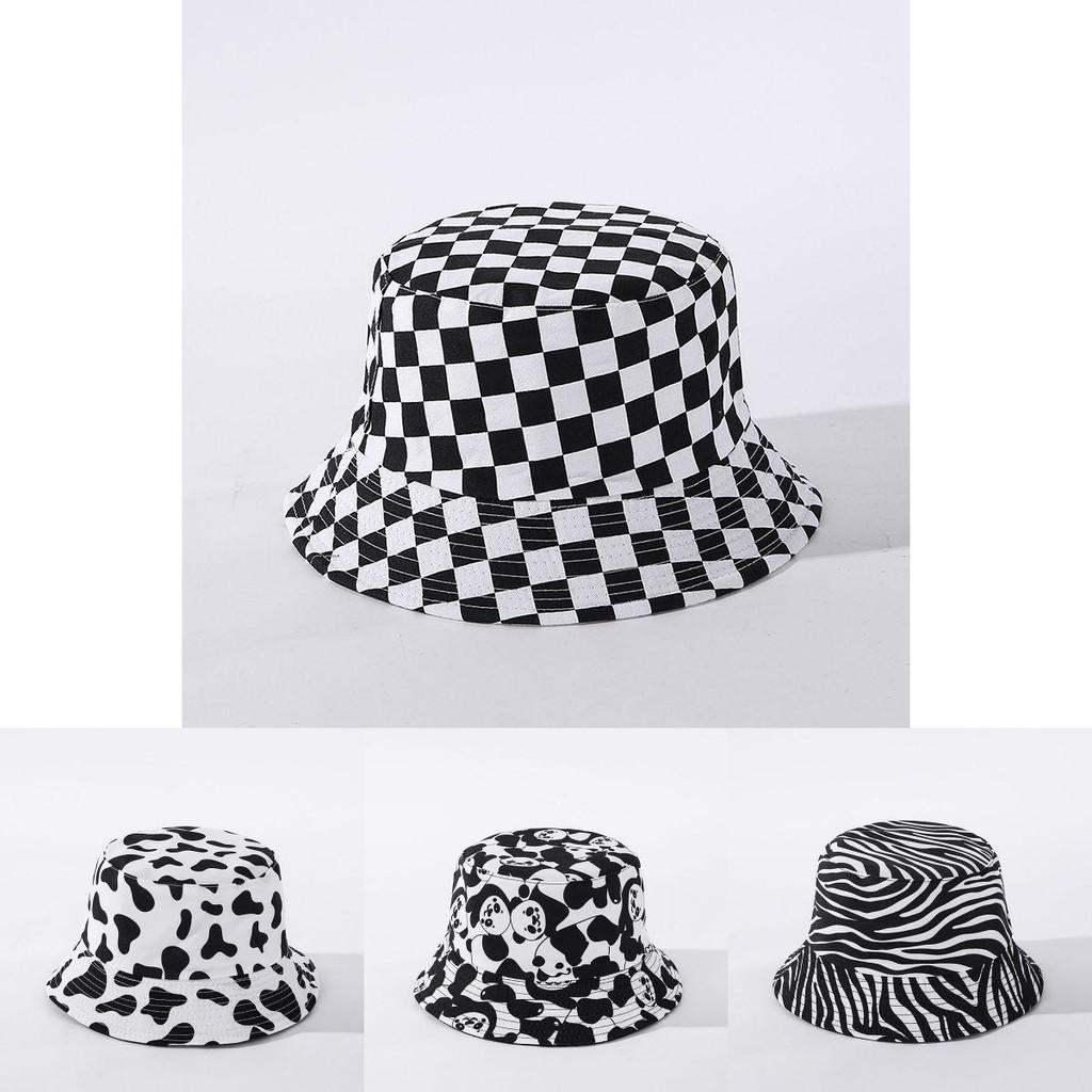 Elegante cappello da pescatore pieghevole con stampa in bianco e nero e toppa a forma di faccina sorridente, unisex.