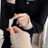 2025 Autumn/Winter European Hepburn Style Little Black Dress: Elegant Knit for the Sophisticated Socialite