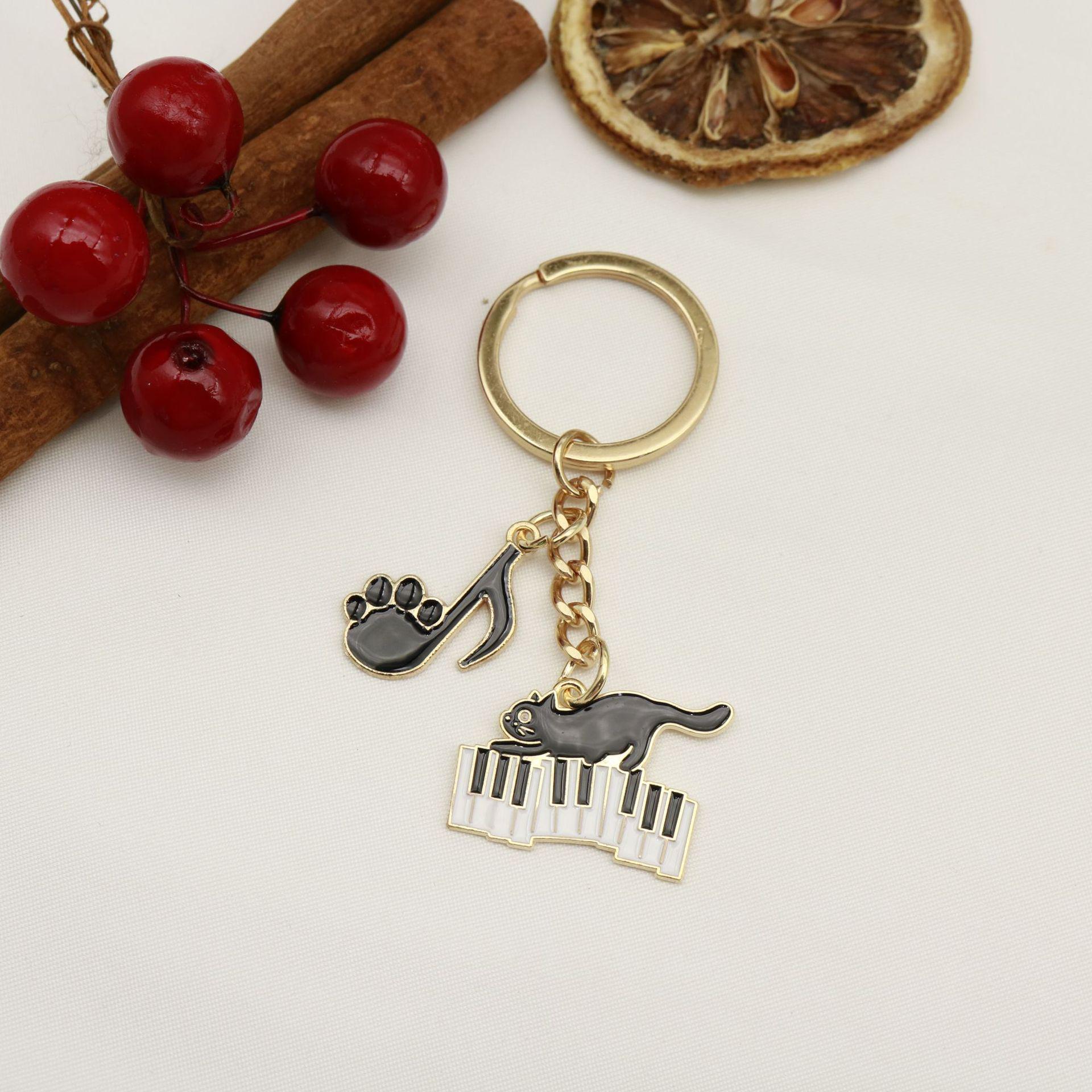 Cat Piano Notes Alloy Keychain Pendant золотой