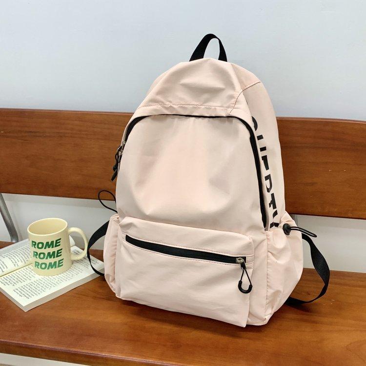 Schoolbag Korean version girl light solid color simple small schoolbag women large capacity junior high school high school students computer backpack