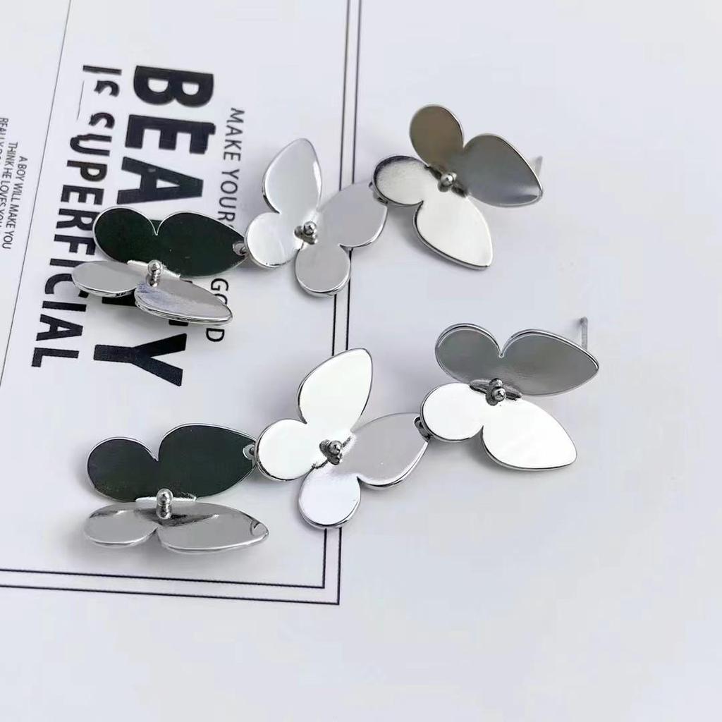 Gold-Tone Geometric Twist Earrings: Fashionable and Versatile Multi-Layer Braided Earrings for Women.