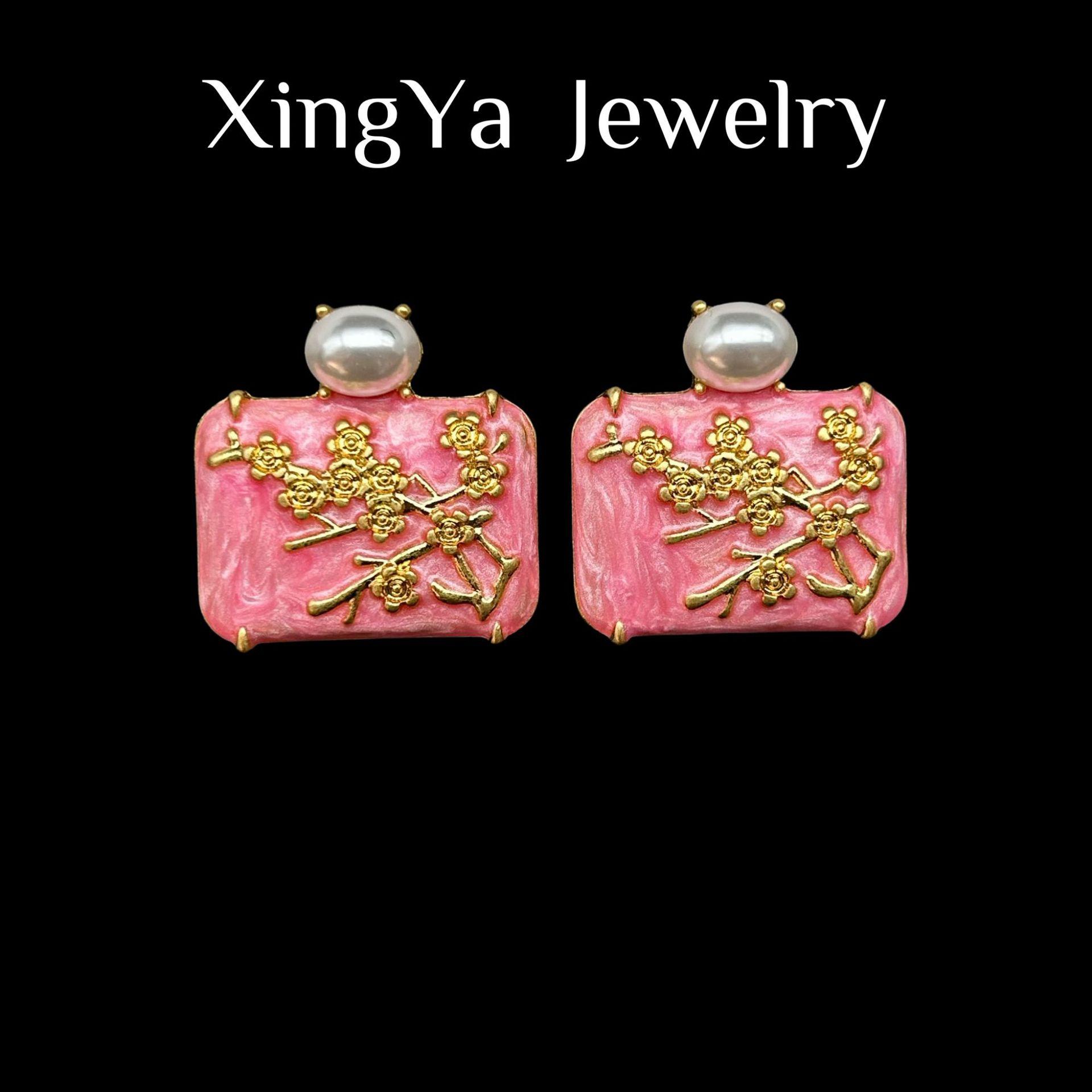 

Middle Aged Enamel Glazed Square Three-dimensional Wax Plum Petal Earrings Available In Two Colors New Chinese Retro