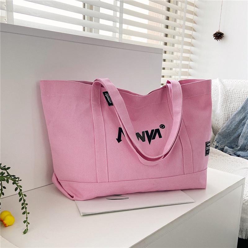 IELGY canvas bag women s single shoulder large-capacity Japanese black fashion handbag