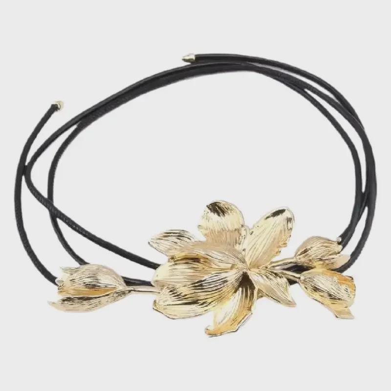 Goldener Tulpenblumengürtel: Retro Schwarze Lederbauchkette mit Rock Jeans Akzent