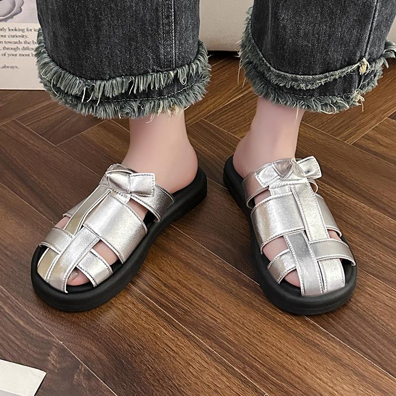 2025 summer new bag head half slippers female retro woven cool slippers female retro fairy wind soft flat Roman shoes