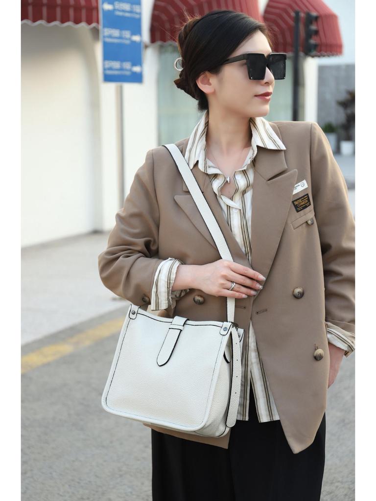2025 Retro Genuine Leather Women's Bucket Bag - Top Layer Cowhide, Fashionable Single Shoulder Crossbody for Autumn/Winter Europe & America.