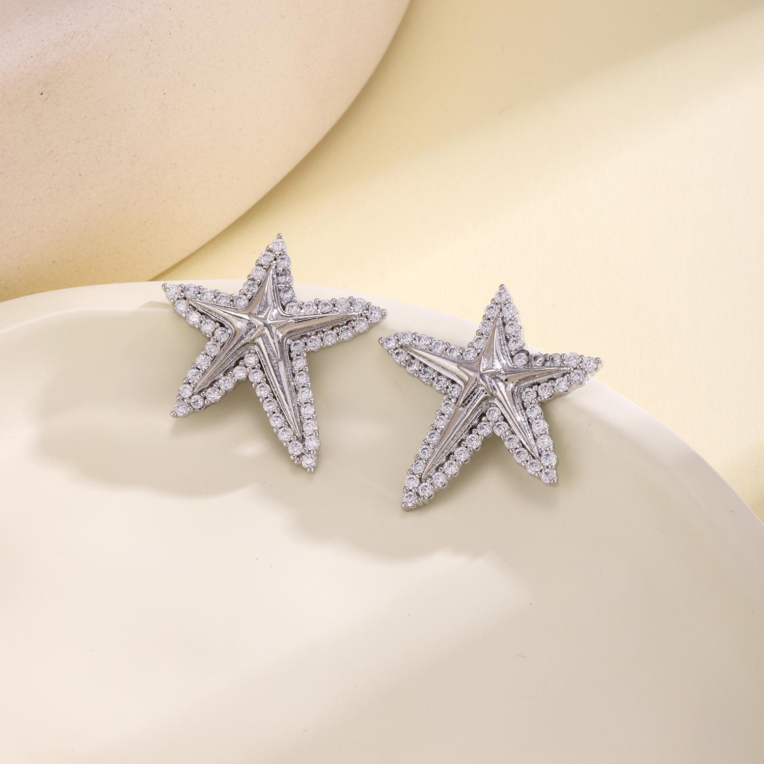 

Nidin New Fashion Starfish Stud Earrings For Women Sparkling Cubic Zirconia Summer Beach Nautical Sea Star Ear Jewelry Gifts серебряный