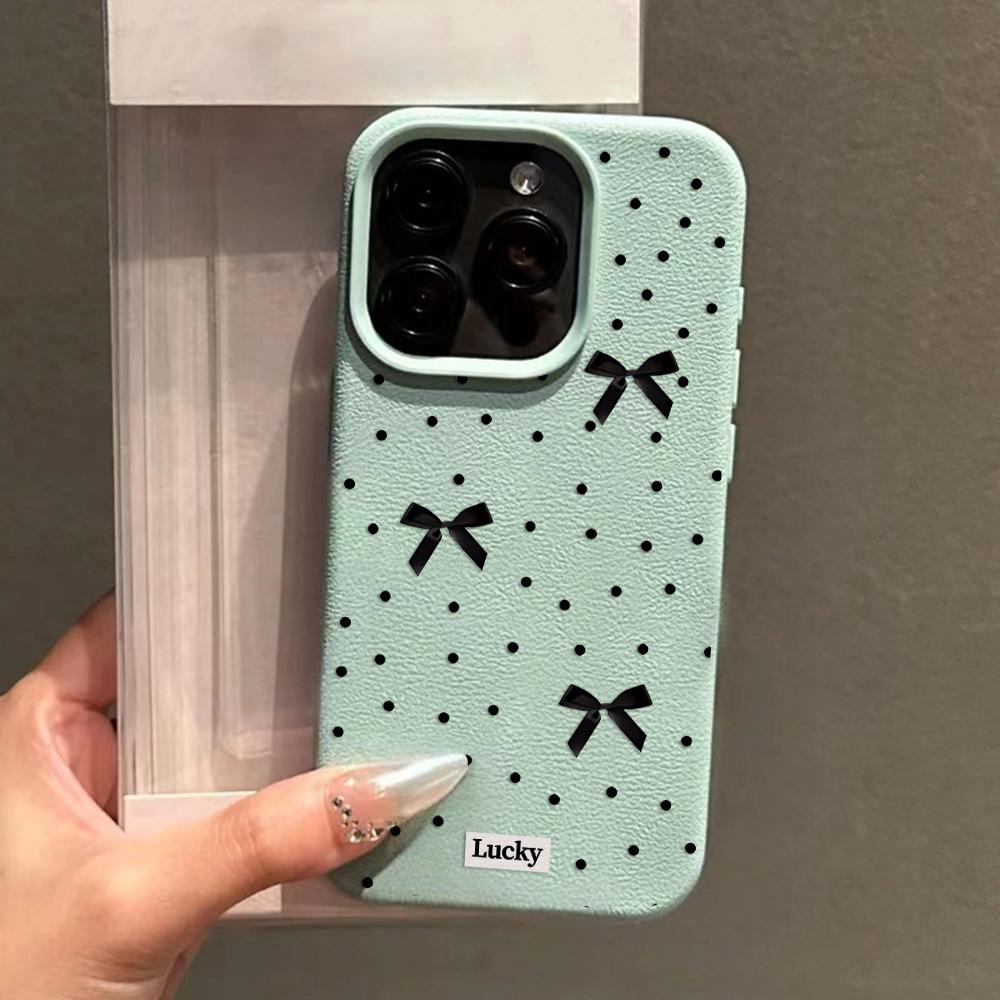 Black polka dot bow is suitable for iPhone17 Pro leather pattern mobile phone case 17 all-inclusive 15 large holes 16 soft case factory