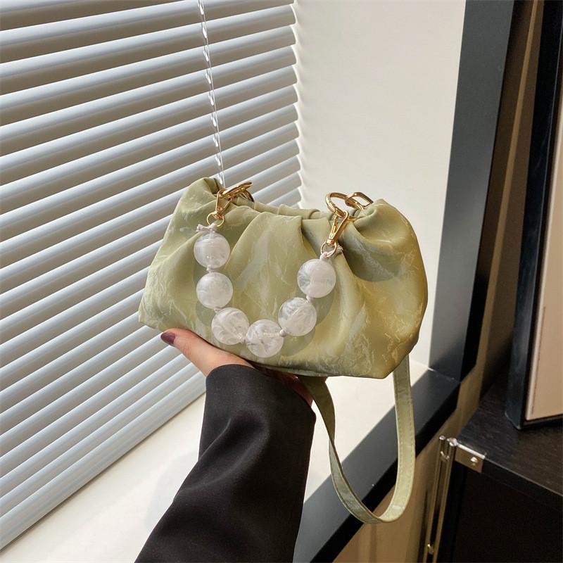 Chic And Versatile Bucket Style Cloud Handbag For Women Featuring Unique Stitching Design