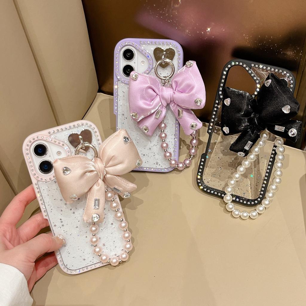 For iPhone 16 Plus Case Glitter Epoxy Design TPU+PC Phone Back Cover with Bow Strap,Rhinestone Decor