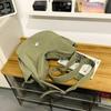 Hua'er and Xiao have the same casual trendy brand dumpling bag, women's sports cycling messenger bag, and boys' large-capacity shoulder bag.