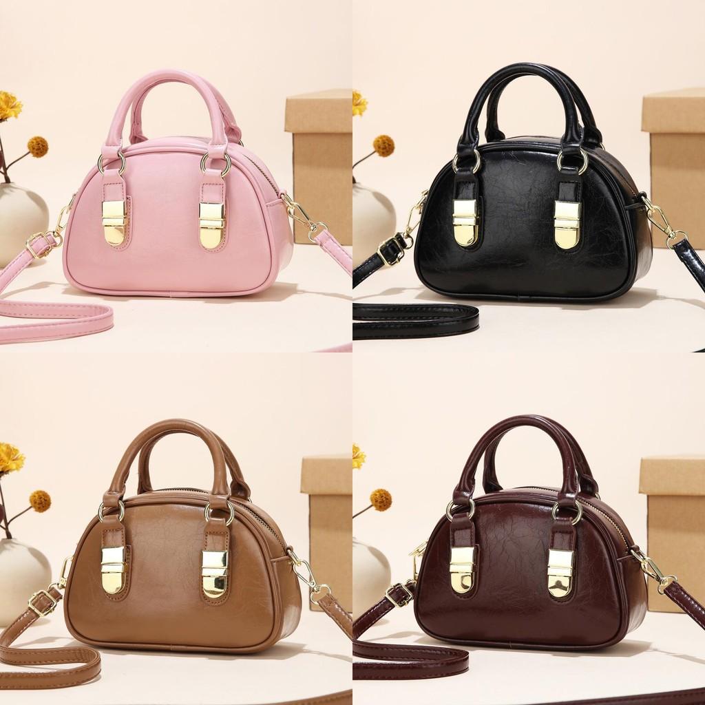 Spacious Elegant And Shoulder Bag For Women With Unique Shell Shape And Durable Lining Polyester