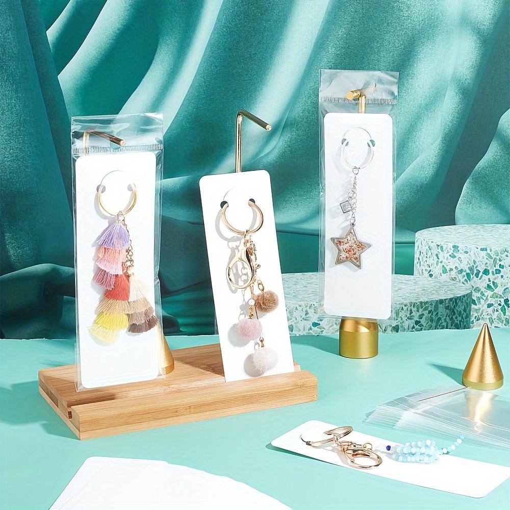 100pcs White Keychain Display Package Paper Cards Holder with 100pcs Transparent Self-Sealing Bags for Selling Bracelet Keyring Small Business