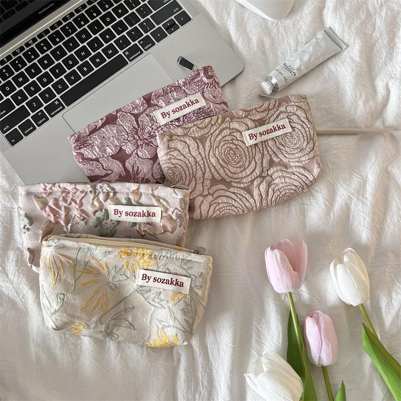 Trendy Ladies Simple And Portable Floral Embossed Cosmetic Bag For Use Everyday