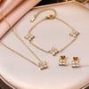 Elegantes 18 Karat Gold Zirkon Kleeblatt Schmuckset: Armband, Halskette, Ohrringe