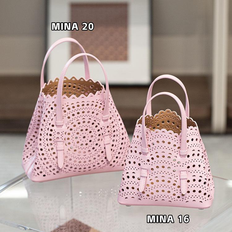 Velkoobchodní továrna prémiová niche vyřezávaná dutá taška na zeleninu Mina kožená dámská taška přes rameno crossbody tote taška