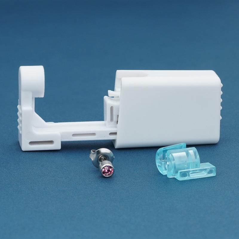 Безболезненный стерильный одноразовый пистолет для пирсинга ушей с профессиональными гвоздиками