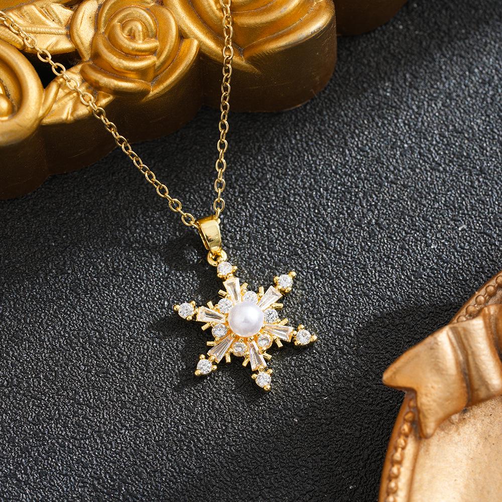 

Cross-Border European & American Pearl Snowflake Titanium Steel Necklace: Women s Clavicle Chain with Niche Design