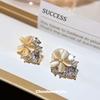 opal flower ear clips without ear piercings, high-end sense, niche fresh earrings, commuting versatile, simple temperament, mosquito coil disc