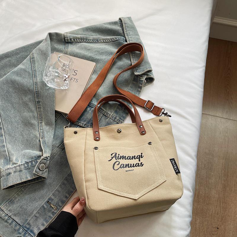 

2025 Winter Retro Textured Canvas Crossbody Bag with Letter Print хаки