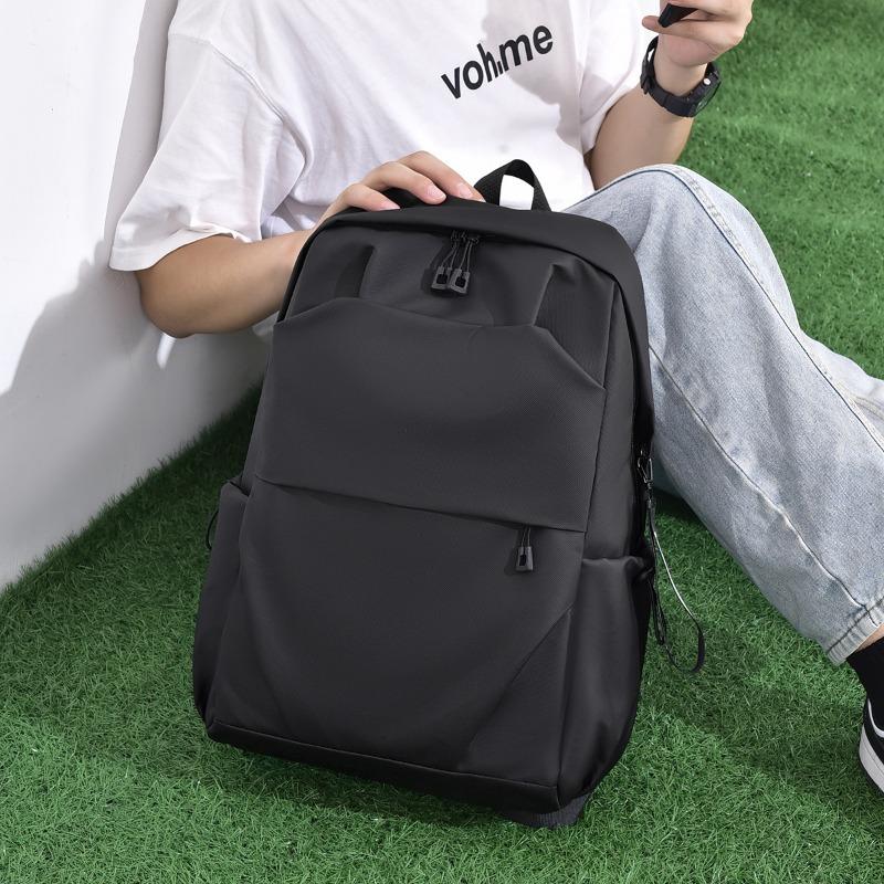 Men's backpack large capacity solid color simple business travel computer backpack junior high school student