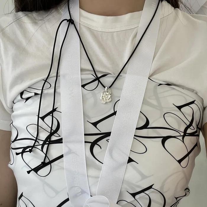 deep rose black string necklace