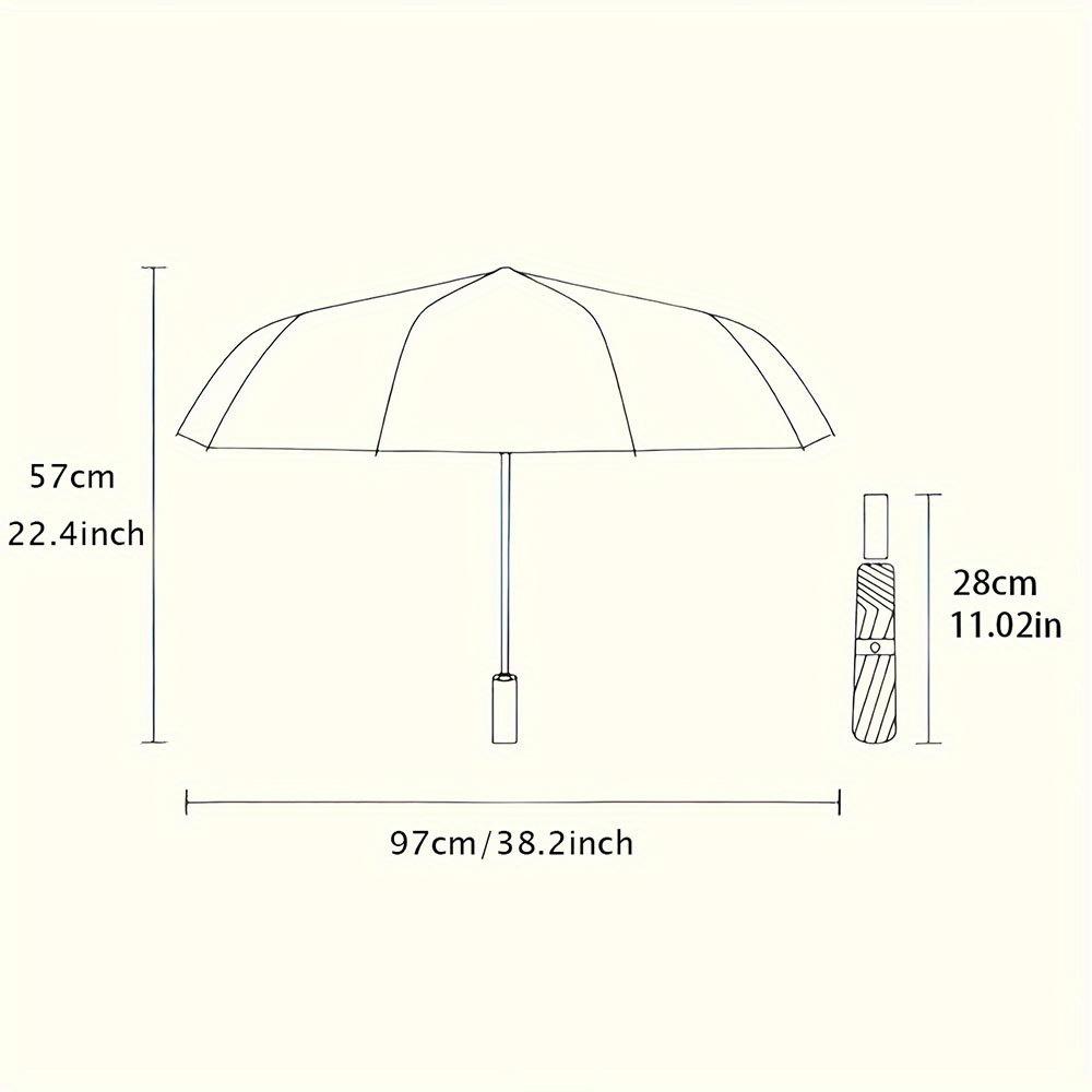 Folding Umbrella The umbrella features pastel-colored tropical leaves and flowers against a light background. Fits Travel, Bac