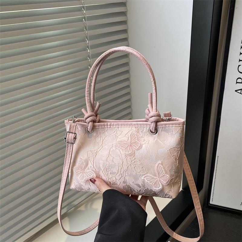 Minimalistische Spitzen-Schmetterlings-Handtasche mit Stickereien für Sommer-Casual-Outfits