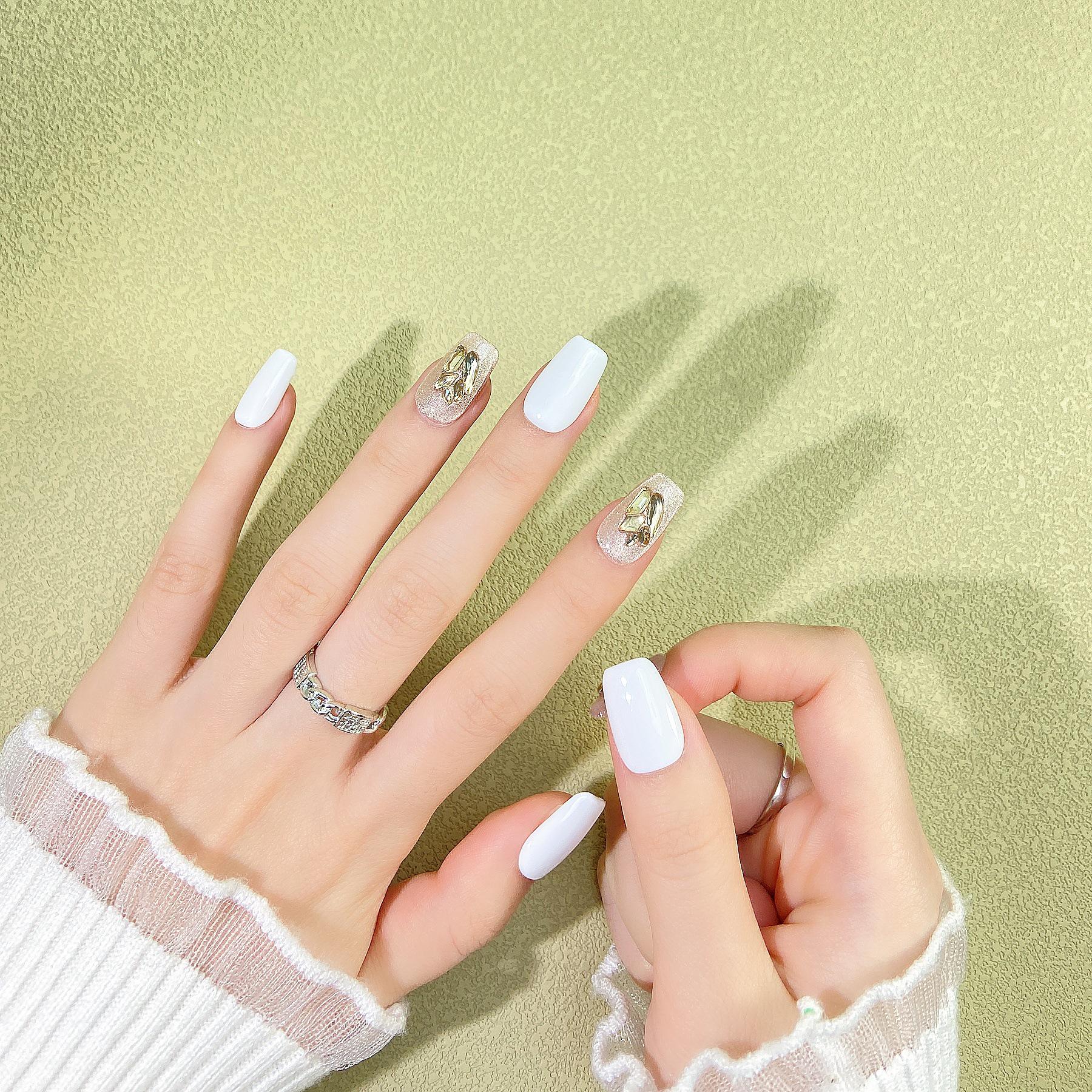 Exquisite Gradient Milk White Cat Eye Nails with Gold Foil Crushed Diamonds, Long Oval Shape, Hand-Painted Wearable Art.