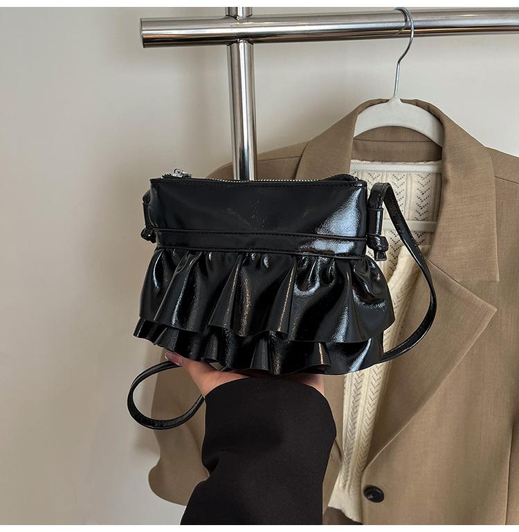 

Сумка женская 2025 лето новая корейская версия нишевый дизайн плиссированная с оборками кромка сумочка повседневная универсальная сумка-мессенджер чёрный