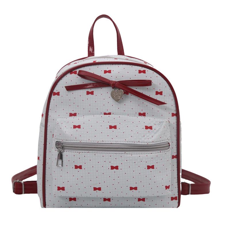 Schoolbag Korean version of college style women's shoulder bag 1011 new summer fashion bow small backpack shopping commuter bag