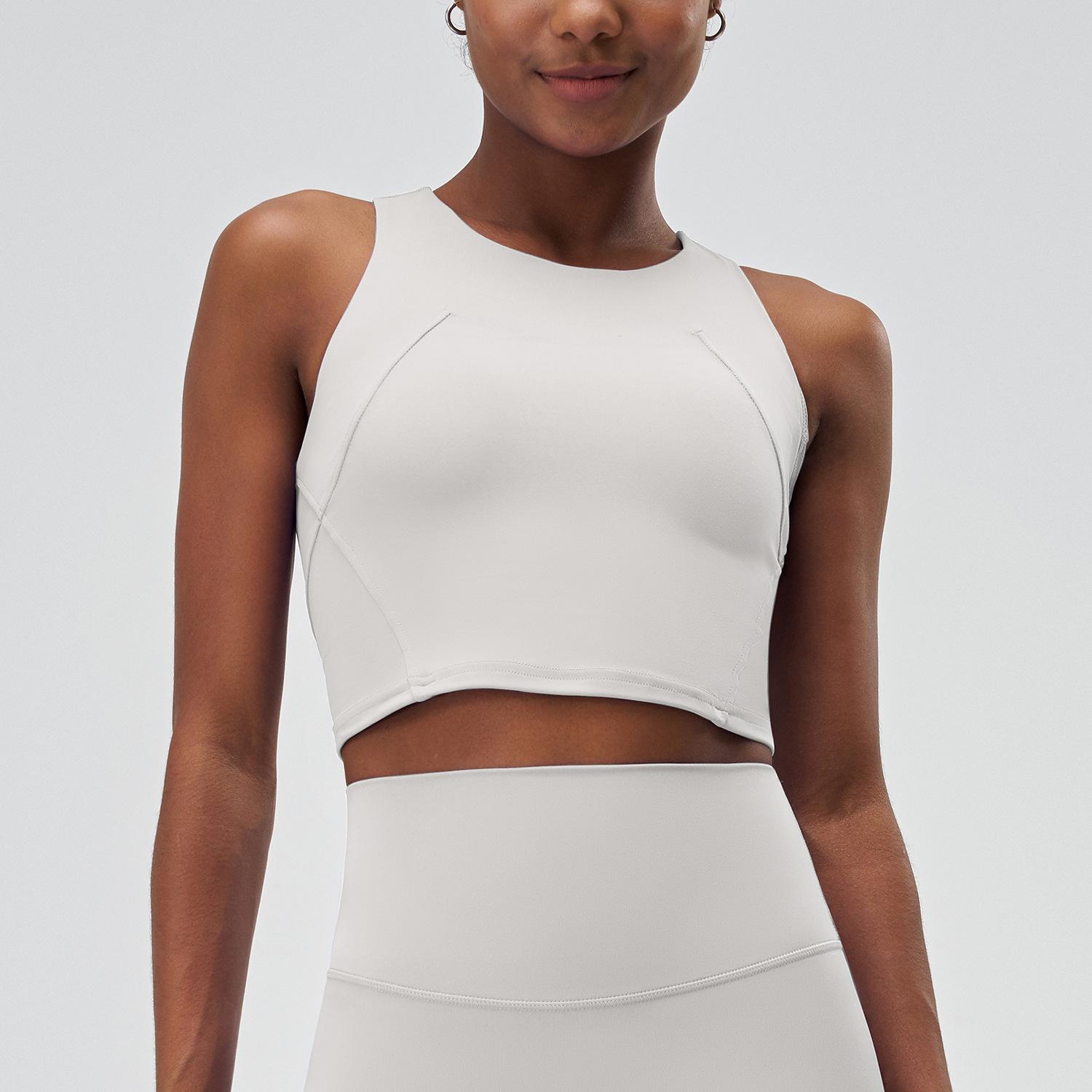 

Женский однотонный удлиненный спортивный бюстгальтер со спиной-борцовкой, цельный быстросохнущий жилет для йоги, топ для фитнеса без рукавов L белый