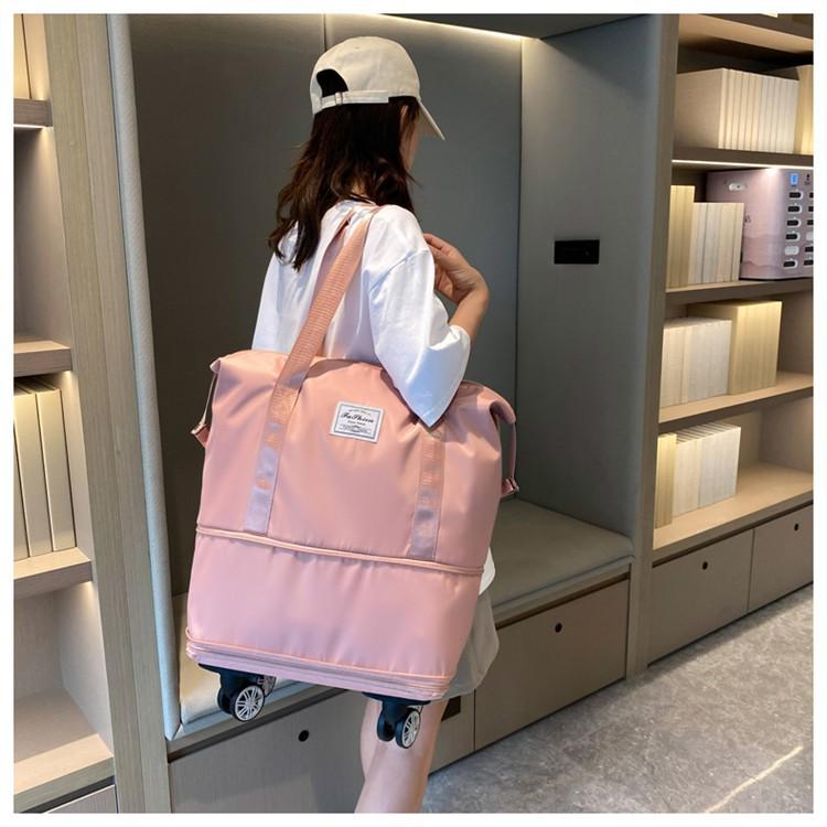 Extra-Large Expandable Travel Duffel with Wheels: Wet/Dry Separation, Lightweight & Practical for Prenatal Storage & Business Trips.