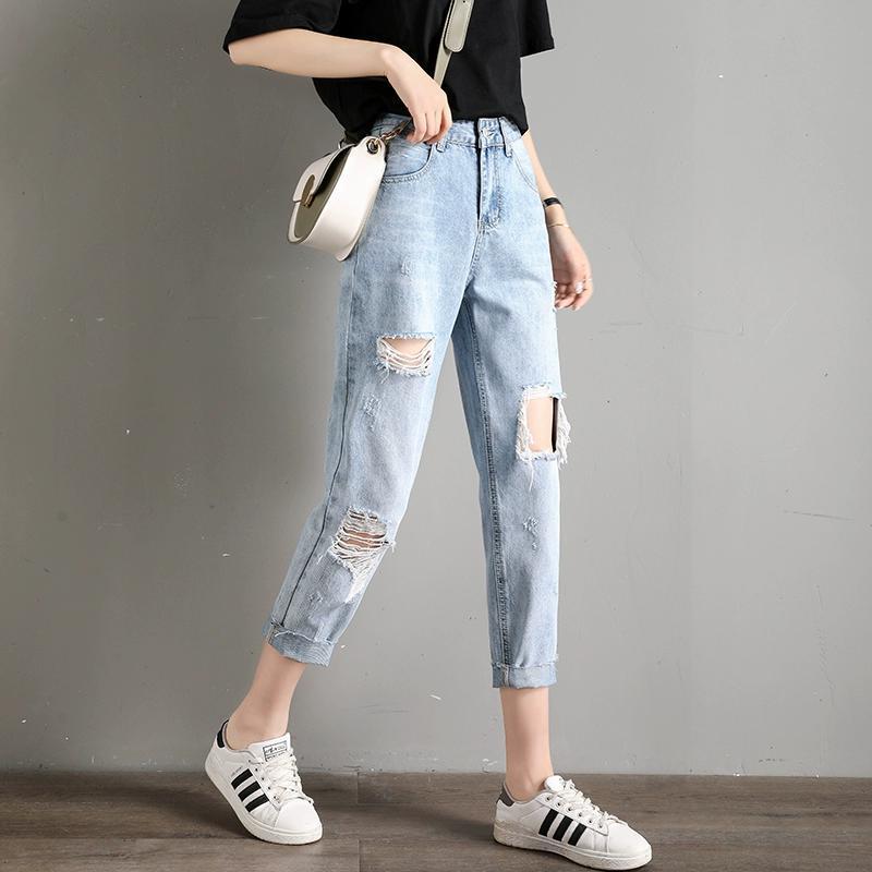

2024 Summer Women s Slimming Ripped Jeans - Trendy Nine-point Casual Pants 31 (130-140 lbs) светло-синий