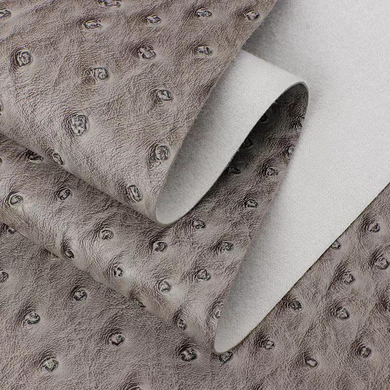 Umweltfreundliches hydrolysebeständiges 0,9 mm PVC-Leder mit Straußenmuster für Gepäck, Handtaschen, Möbel, Geschenkboxen und Gürtel