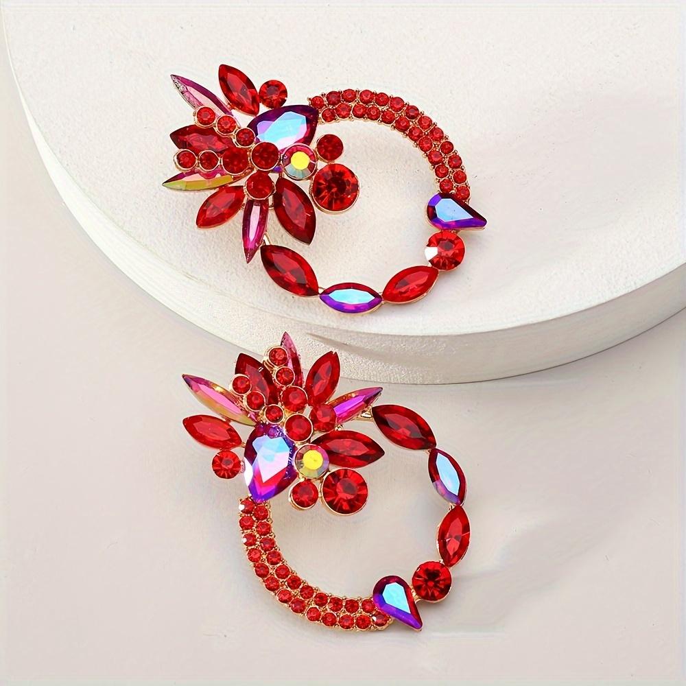 

Bohemian geometric stud earrings with colored rhinestones. Floral luxury design, elegant daily wear and gift-ready. червоний