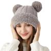 Niedliche Damen Wintermütze mit Bommel aus Wolle, Plüschrand und Ohrenschutz