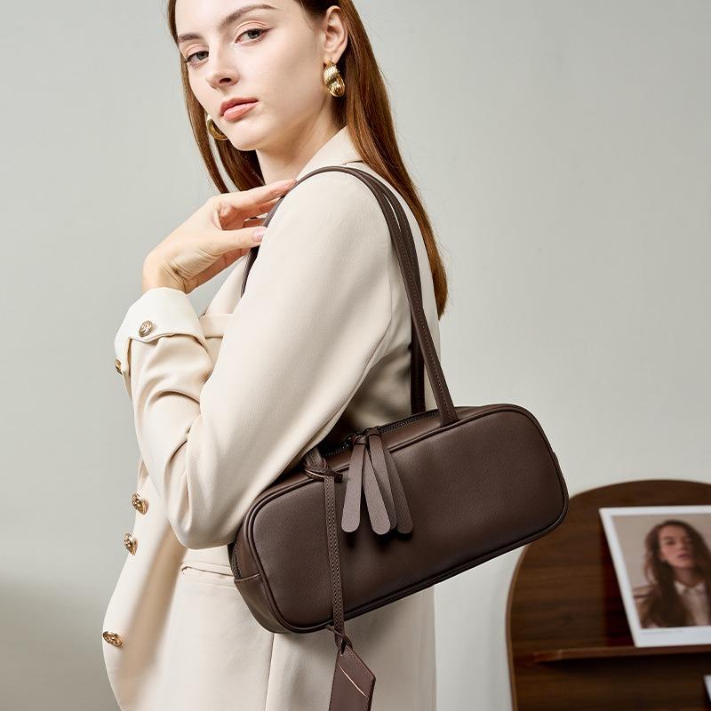 First layer cowhide bowling bag women's Korean version, women's bag commuting niche baguette leather high-end underarm bag