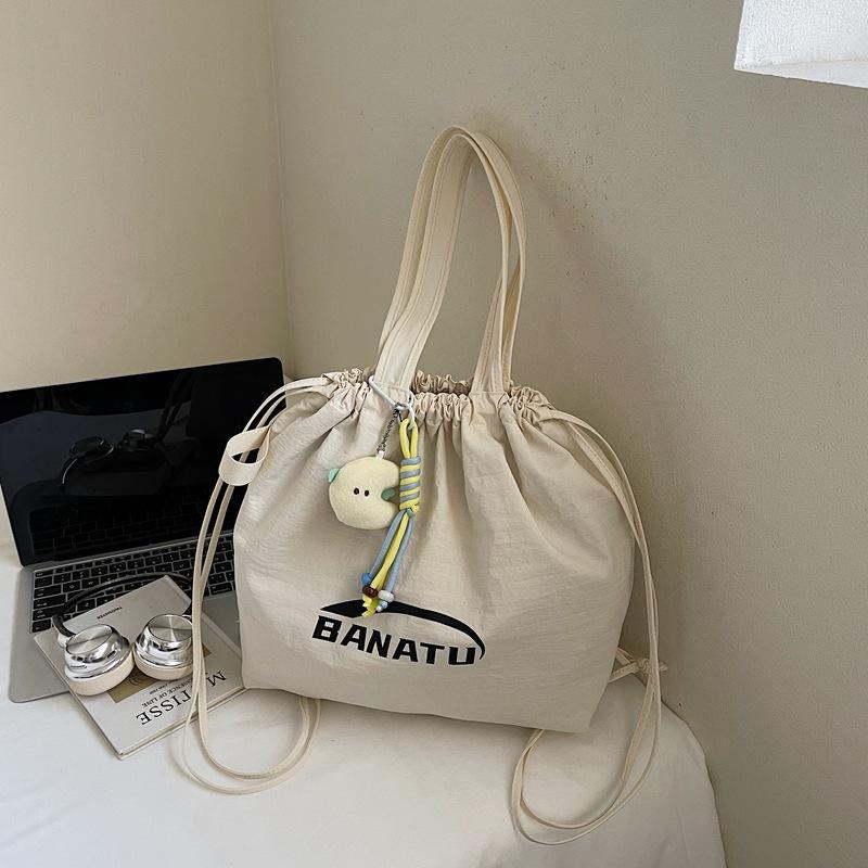 

Tote bag women 2025 new large-capacity commuter backpack canvas versatile ins shoulder bag premium feeling backpack no pendant