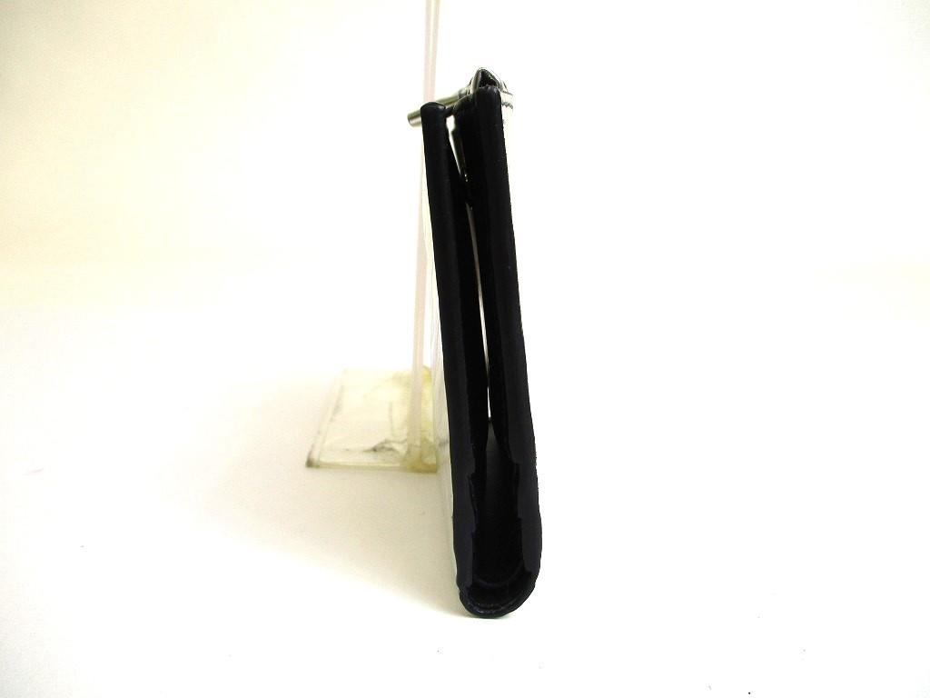 Prada Portefeuille compact à deux volets en cuir argenté et noir #a592