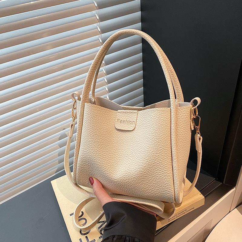 

Handbag Women s 2025 New Spring and Summer Niche Bucket Bag Commuter Versatile Shoulder Messenger Bag Popular Women s Bag
